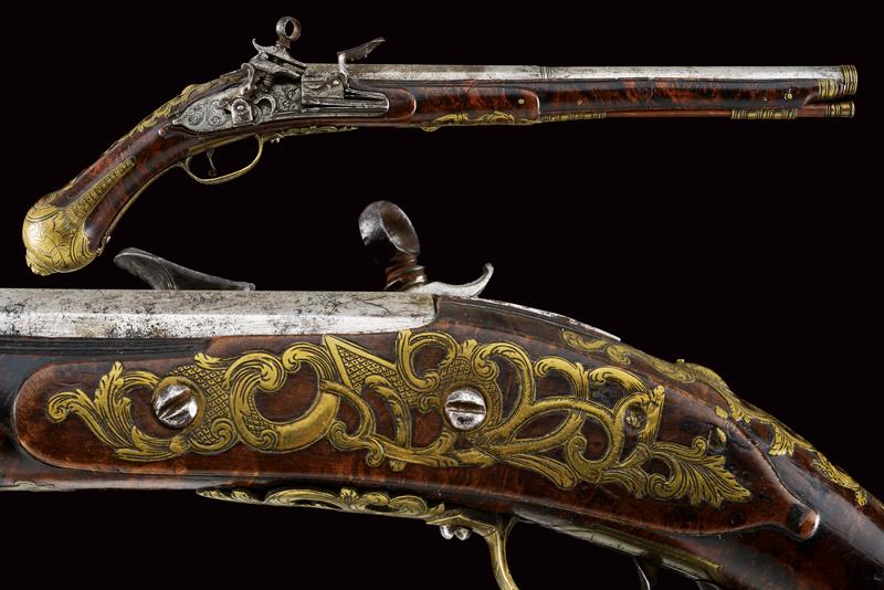 Pistola a pietra focaia alla romana
