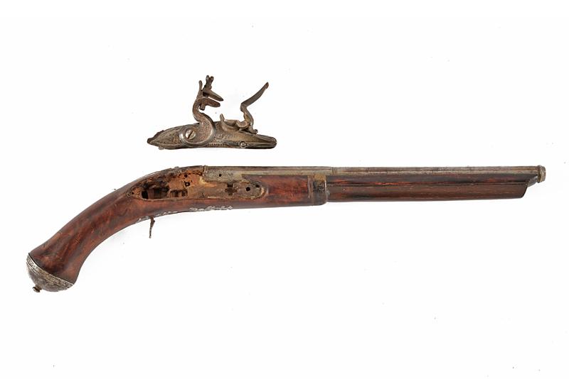Pistola a pietra focaia composita