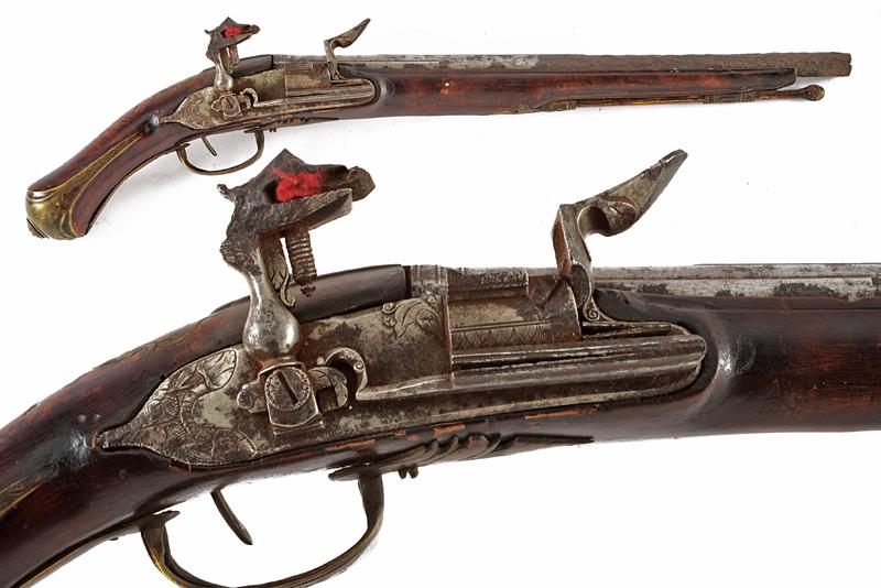 Pistola a pietra focaia alla romana