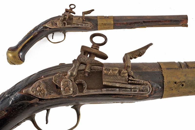 Pistola a pietra focaia composita