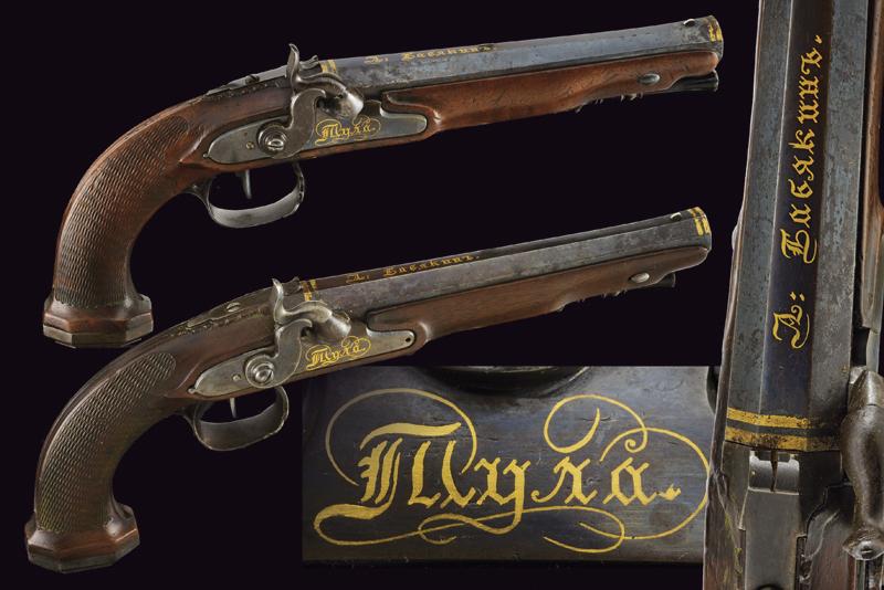Raro paio di pistole a luminello da tiro di A. Basiakin con fondine