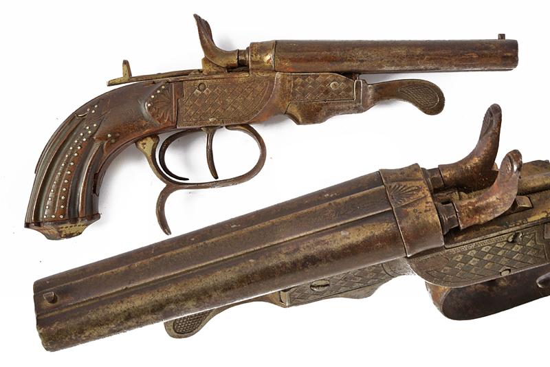 Pistola a retrocarica a percussione centrale a due canne