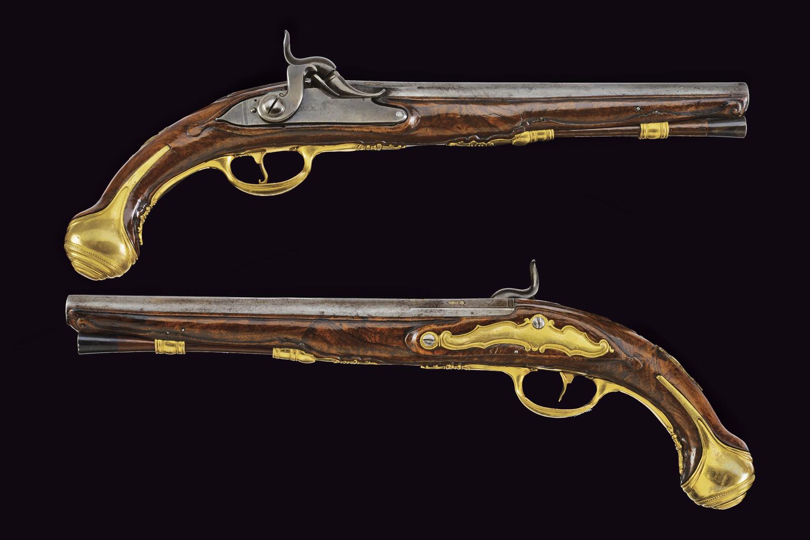 Paio di pistole ridotte a luminello