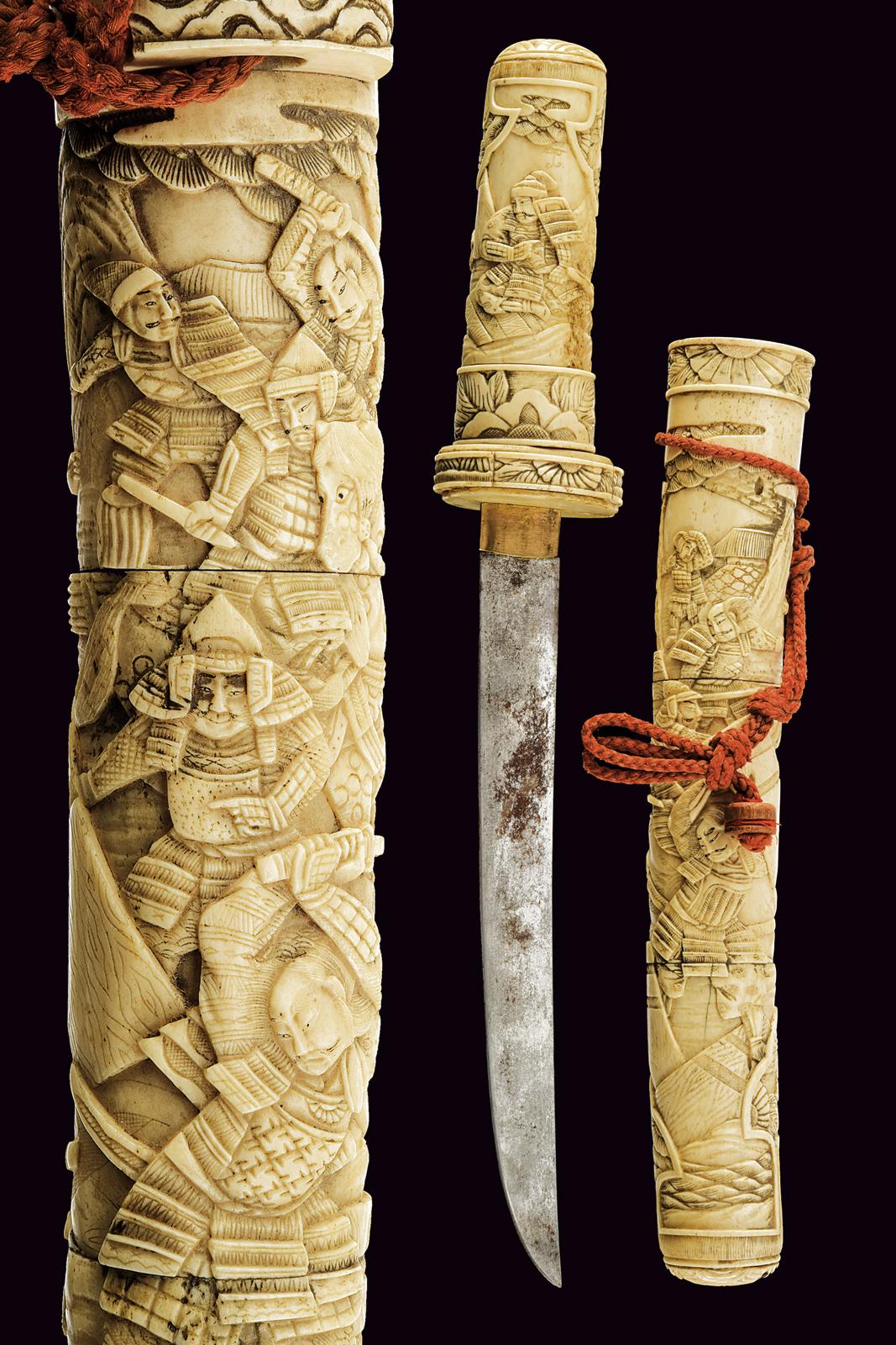 Tanto con montatura intagliata
